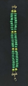 Double stranded bracelet made with polymer clay beads coated with Emerald PearlEx powder.
