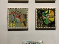 Four mixed-media collages and three art journals by Carolyn Hasenfratz Winkelmann displayed at the Back To Our Roots show.