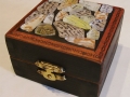 This box was decorated on top with faux beach glass pieces backed with decorative paper.