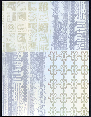 Front of card with layer of ink brayered over the background stamps