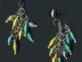 Earrings made from metal beads and seed beads and chain recycled from thrift store jewelry.