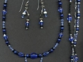 Blue, black and silver jewelry.