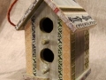 This decorative bird house was decoupaged with paper pieces, some rubber stamped with permanent ink.