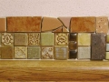 I'm in the process of improving my kitchen backsplash with tile work. Here is a closeup showing some tiles I made and others I salvaged mixed with a few that I purchased.